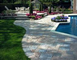 Swimming Pool Cool Stone Pool Deck Design Backyard Swimming Pool With Paving Stone Deck Also Green Grass And Coloeful P Stone Pool Deck Stone Pool Paver Patio