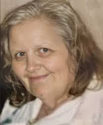 This is my lovely Nan who is no longer with us, we absolutely love this  photo and would like it developed for a memory display. Can someone please  please work their magic