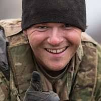 Capt. William Whitfield, probes for possible land mines