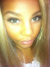 In dark brown with soft light chestnut brown highlights, a high bun is gorgeous. Blonde Hair On Mixed Race Girl Beautylish