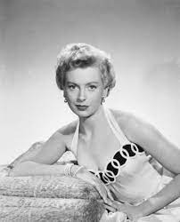 Deborah Kerr in "From Here to Eternity" (1953) I can still hear  British-born Kerr using an American accent and calling Burt Lancaster  "Sergeant" with a hard R.