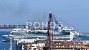 4k Black Smoke Cruise Ship Bridge Puente De Vizcaya Colgante River Bilbao Spain Stock Footage Bridge Puente De Ship Cruise Ship Cruise Black Smoke