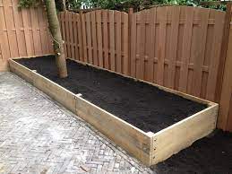 verhoogde border met steigerhout wooden flowerbed plantenbak tuin randen tuin tuin ideeen