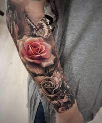 50 Magnolia Flower Tattoos Cuded Coloured Rose Tattoo Rose And Butterfly Tattoo Sleeve Tattoos For Women