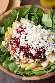 After transferring the vegetables to a serving platter, top with goat cheese and grapes, which pair well with the balsamic marinade. Pear Pomegranate And Spinach Salad Cooking Classy Thanksgiving Salad Recipes Spinach Salad Salad Recipes