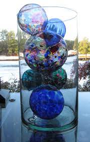 Hand blown vases, bowls, paperweights, decorative glass floats, business gifts, art glass for home, office or garden available for purchase online. Decorative Glass Balls Glass Balls Display Glass Window Art Glass Fishing Floats