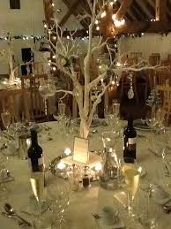 Although they might not have the vibrancy of greens, reds and whites, a dried flower bouquet can still use warm colours and additions like feathers for a rustic and textural. Pin By Julia Price On Venue Styling Ideas Wedding Centerpieces Christmas Wedding Wedding Table