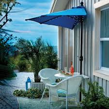 The best outdoor umbrellas will be wind resistant and this is achieved by a few things in the design. Battery Lighted Half Umbrella Patio Umbrellas Patio Patio Design