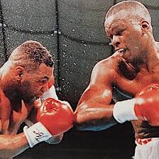 42-1 Buster Douglas beats all odds .