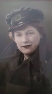 My mother in 1937 The handbag has a Gold RAF Badge