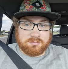 What are the rifles and shotguns in the photo?