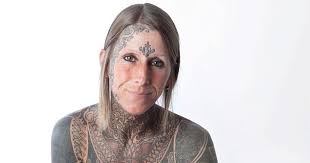 UnpredictableEngee's Blog: Woman celebrates divorce by asking new partner  to tattoo her ENTIRE body