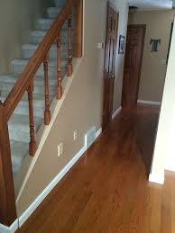 Image Result For White Baseboards With Wood Window Trim And Door White Baseboards Baseboard Styles Basement Remodeling