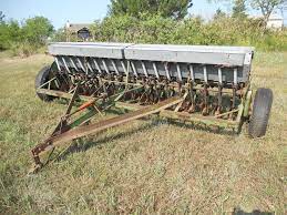 Old john deere van brunt grain drill with steel wheels, wood boxes, grass seed attachment. W5tgv7y8lwfgm