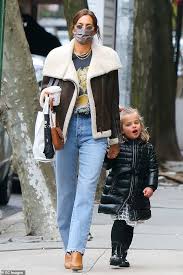 The mum , 35, and lea, four, wore their matching burberry coats in new york. Irina Shayk Looks Stylish In A Britney Spears T Shirt As She Steps Out With Daughter Lea Readsector Female