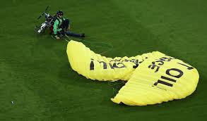 A greenpeace paraglider lands in the stadium prior to the euro 2020 soccer championship group f match between france and germany at the allianz arena stadium in munich, tuesday, june 15, 2021. Zzesndlg6kanlm