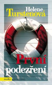 A woman makes her way past towels and parasols. Prvni Podezreni Knihcentrum Cz