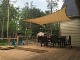Tilted or twisted overhead, shade sails provide protection from the sun on hot. Pool Shade Patio Sails Sun Shade Sail Installation Ideas