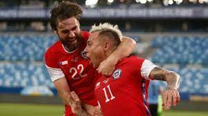 Uruguay's maximiliano gomez, right, celebrates with teammates after scoring the winner against chile. Xos3nnqxdhkofm