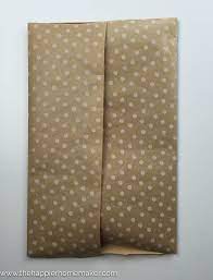 It S Easy To Make Your Own Diy Gift Bags In Under 5 Minutes Using Wrapping Paper Tape And Ribbon How To Make A Gift Bag Diy Wrapping Paper Diy Gift Bags Paper