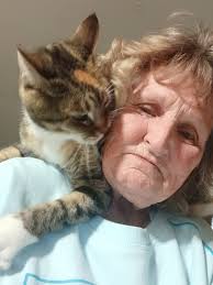 Cats bringing comfort and joy to their owners lives