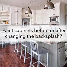 Many older homes have laminate kitchen cabinets that aren't exactly on trend today. Painting Cabinets Before Or After Changing The Backsplash
