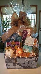 They'll love this gift basket of goodies to enjoy whether their stuff is still on the truck or half packed up and stacked in each room. Welcome To Your New Home Gift Basket Diy Gift Baskets Christmas Gift Baskets Diy 30 Diy Christmas Gifts
