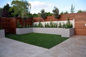 Popular modern garden bed of good quality and at affordable prices you can buy on aliexpress. Hardwood Screen Grey Render Raised Beds Travertine Cream Paving Bespoke Storage Small Garden Design Modern Garden Design Minimalist Garden