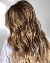 This picture demonstrates silver hair highlights on the fringe. 50 Best And Flattering Brown Hair With Blonde Highlights For 2020