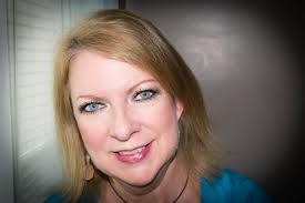 Update: I took the color photo and then I changed their pose and took the  black-and-white one. So the color photo was the first one. Black-and-white  was the second one. Not looking