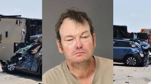 Semi driver sentenced to 9 years for crash that killed mother, twin  daughters