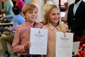 Congratulations to our students who were inducted into the National  Elementary Honors Society this morning! 💜 The National Elementary Honor  Society recognizes students for their academic excellence, leadership,  service, and responsibility. 6th