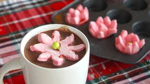 Pop These Marshmallows Into Your Hot Chocolate And Watch Them Bloom Into Pretty Poinsettias Recipes With Marshmallows Christmas Hot Chocolate Chocolate Bomb