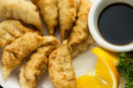 Pork and seeds pork loin marinated, baked and served with sesame seeds and hot mustard. Pot Stickers Deep Fried Picture Of Dee Kitchen Idaho Falls Tripadvisor