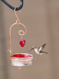Watching little hummingbirds enjoy a meal is a beautiful moment to capture. Beautiful Red Glass Hummingbird Feeder With Heart Walmart Com Walmart Com