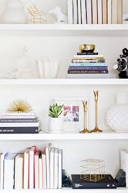 They have chrome cabinet pulls that have a latch release in them. Sarah Sherman Samuel House Update Diy Built In Shelving