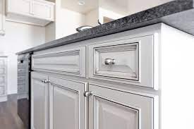 Traditional White Kitchen With A Twist Satin White Cabinets With A Black Glaze Is A Gorgeous Way T Timeless Kitchen White Kitchen Traditional Kitchen Interior