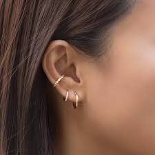 When autocomplete results are available use up and down arrows to review and enter to select. Pave Crystal Gold Conch Ear Cuff Minimal Dainty Jewelry Amyo Jewelry