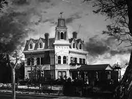My affinity for black and white stripe wallpaper is evident from my house and previous blog posts. The Original Addams Family House Finding Lost Angeles