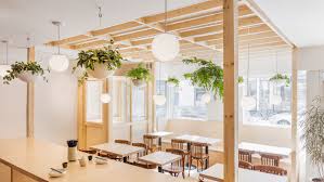 Japanese Restaurant Combines Minimal Details And Unfinished Surfaces