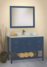 The tub is by americh, the vanity faucet is moen and the sconce is from nuvo lighting. Vanity Finish Inspired By Artwork Qualified Remodeler