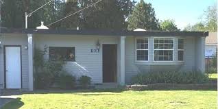 This Intriguing Rambler Has A Fireplace Carpeting And Hardwood Flooring 3 Bedrooms 1 Bath Large Living Room Separate Study Work At Home Of Large Living Room