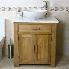 Add accessory organizers to keep personal items tucked neatly away. Oak Vanity Unit With White Marble Top Bathroom Prestige Oak Bathroom Oak Bathroom Vanity Bathroom Vanity
