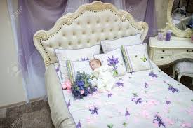 Use them in commercial designs under lifetime, perpetual & worldwide rights. Beautiful Baby Girl Lying Sleeping In Big Ivory Bed Pillow Cover Stock Photo Picture And Royalty Free Image Image 92324868