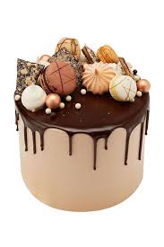 Moist Layers Of Vanilla Caramel And Chocolate Sponge With Salted Caramel And Chocolate Ganache Filling Masked Wit Salted Caramel Cake Drip Cakes Macaron Cake