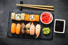 Sushi And Sushi Roll Set On Black Stone Table Top View Sushi Rolls Stone Table Top Table Top View