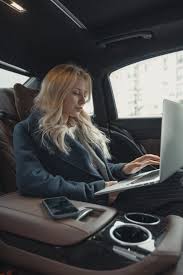 Maybe you would like to learn more about one of these? Woman In Gray Business Suit Sitting At The Back Seat Of A Luxurious Car Free Stock Photo