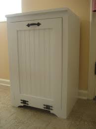 It's made from lumber salvaged from pallets found locally. Tilt Out Wood Trash Can Cabinet Ana White