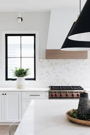 To whitewash furniture, simply add water to white latex paint in a 1:1 mixture. Black And White Modern Farmhouse Exterior Home Bunch Interior Design Ideas