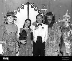 Performers for the Wizard of Oz show from left to right, Tom Van Vranken,  Heidi Hunter Kammer, Lt. Cmdr. Ned Muffley, Wayne Lammers and Phil  Robinson. (U.S. Navy file photo/released) Lollipops-004 by